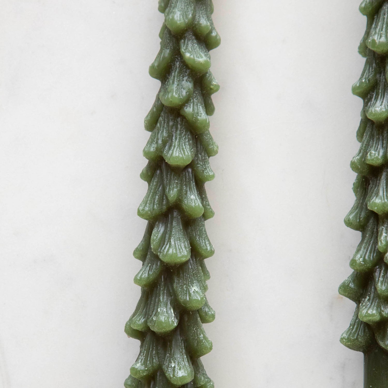 Close up detail of Tree Shaped Taper Candles. 