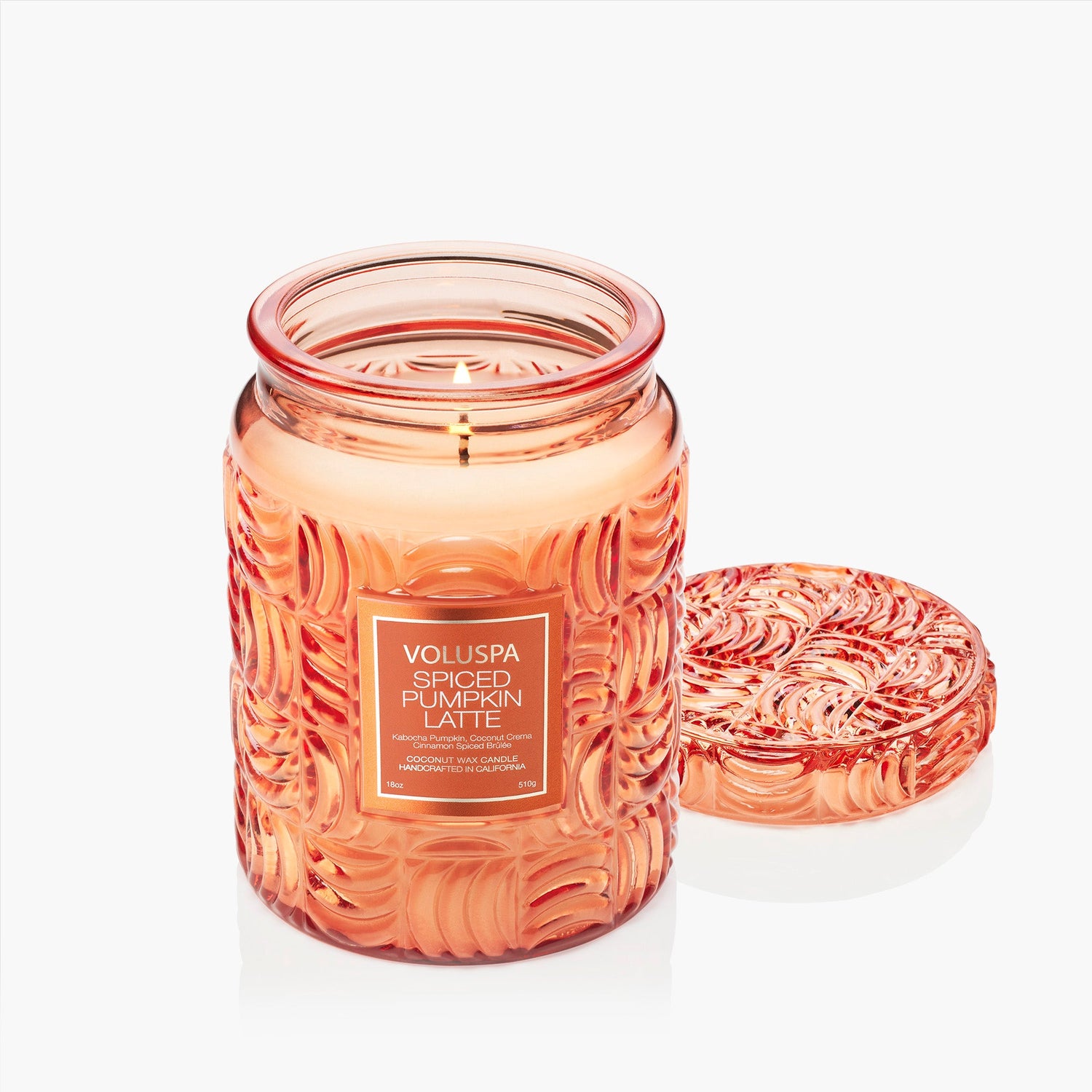 Voluspa spiced pumpkin candle in a decorative jar on a white background
