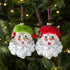 Plaid Santa Head Ornaments in red and green against a lit up Christmas tree.