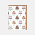 Pattern of cakes printed on a greeting card on a white background. 