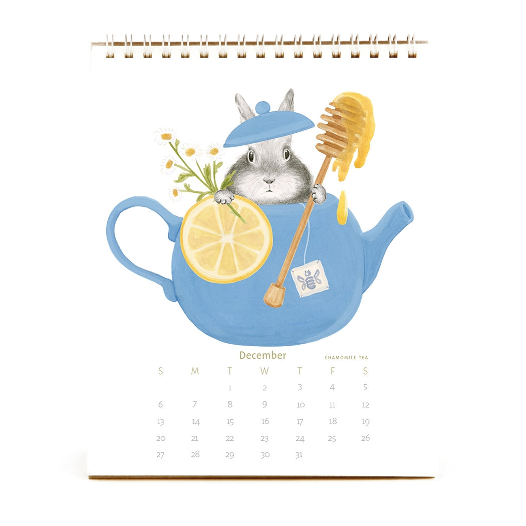 2026 Dear Hancock Bunny Calendar featuring a bunny hidden in a teapot with a lemon slice and a honey dipper.