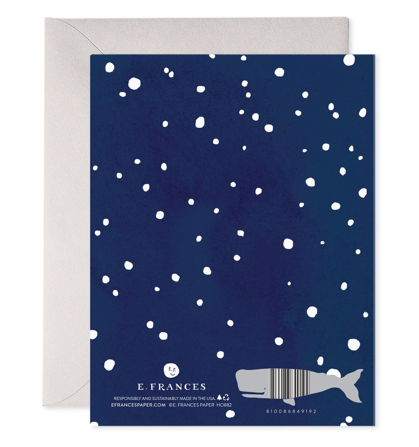 Navy blue card with white snowflakes and whale illustration, featuring E. Frances brand.