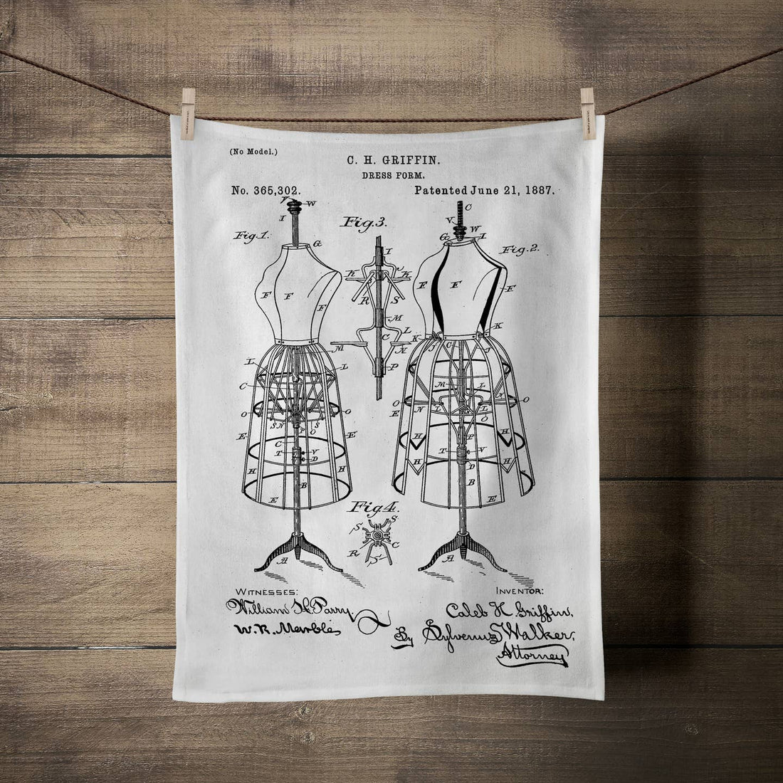 Tea towel with the image of the patent request for the dress form. 