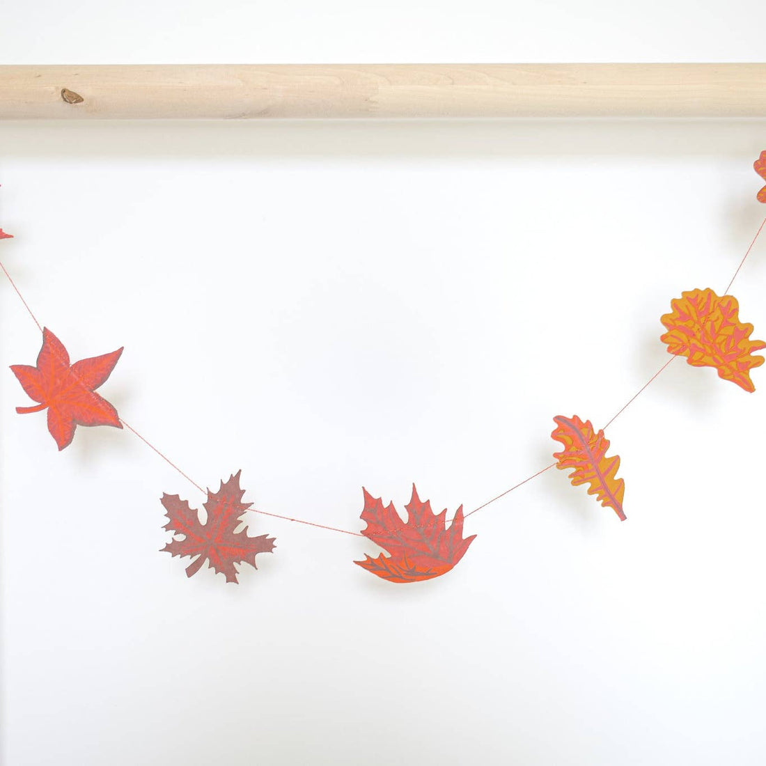 Autumn Leaves sewn garland hanging off a pole. 