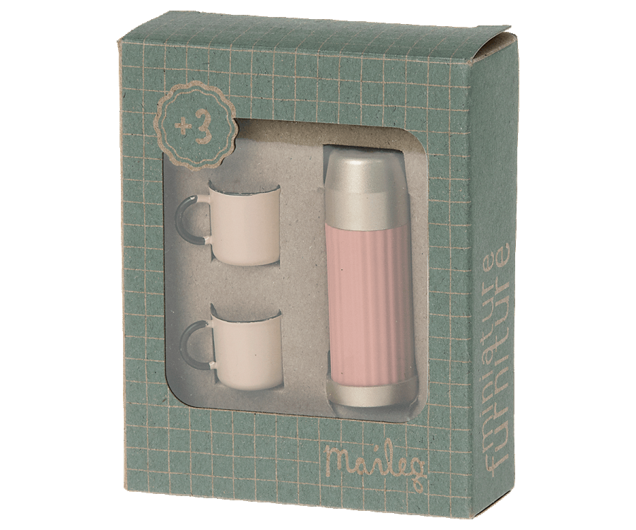 A pink Mini Thermos and Cups Set by Maileg, in a box, perfect for enjoying hot beverages or cozying up with Maileg mice.