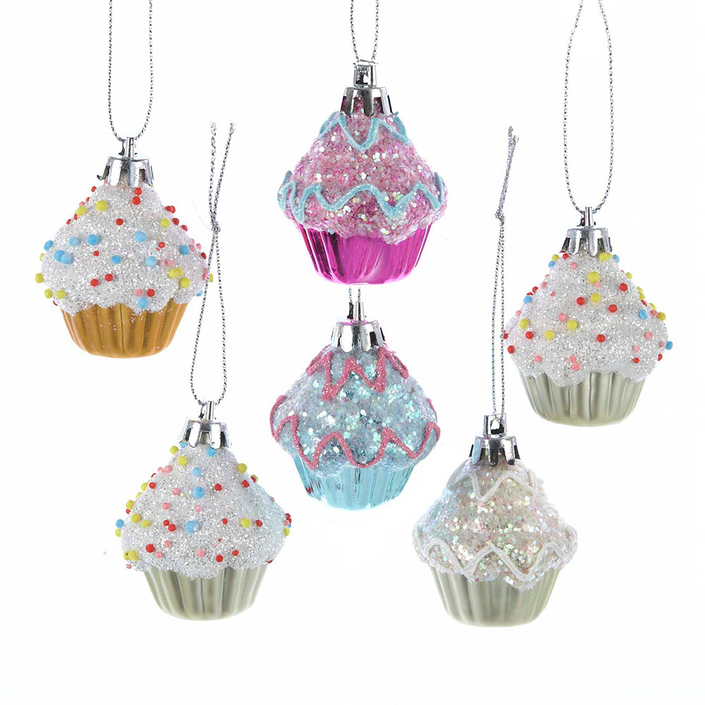 A set of 6 colorful, sparkly cupcake ornaments on silver strings on a white background.