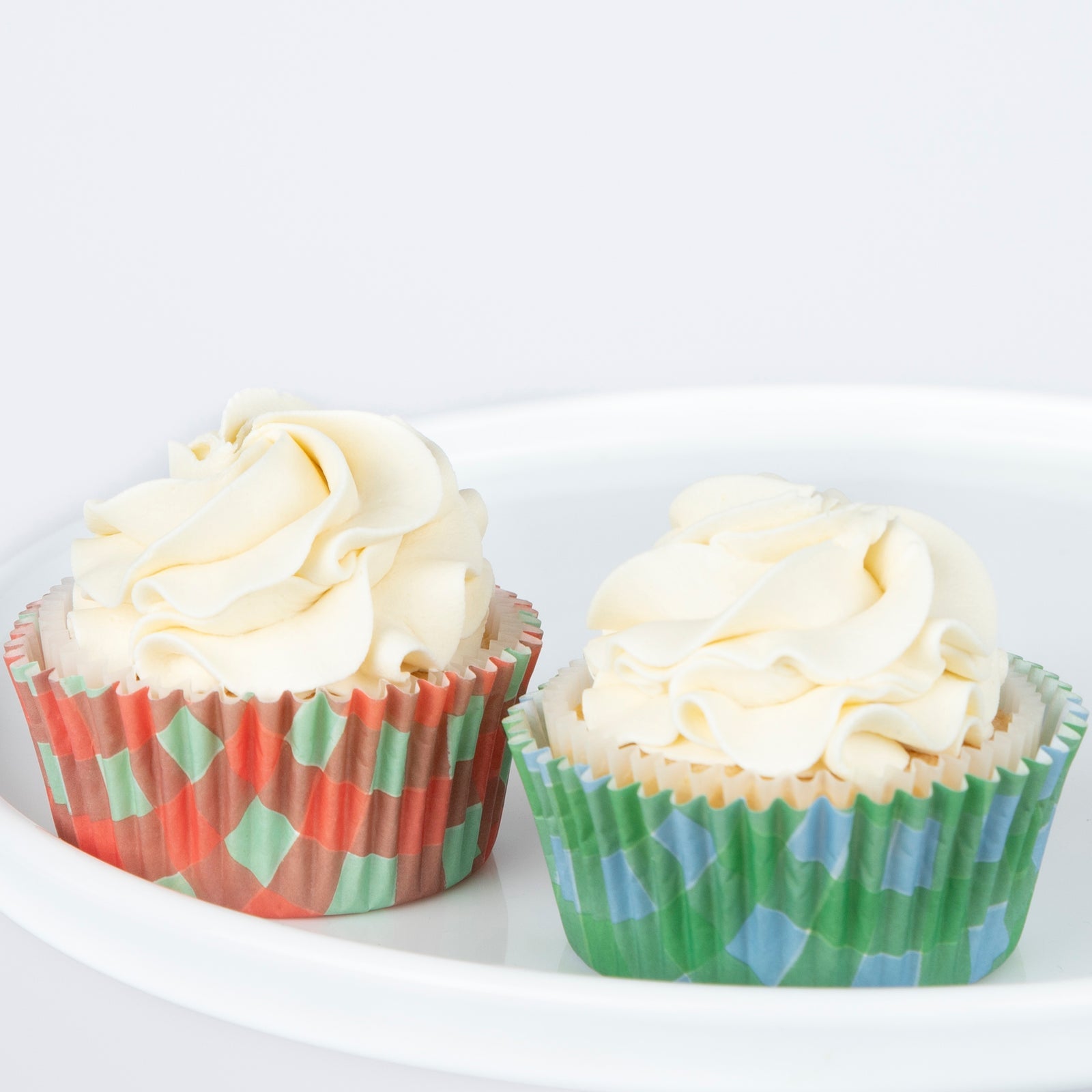 Red and mint, and blue and green cupcake holders by Meri Meri. 