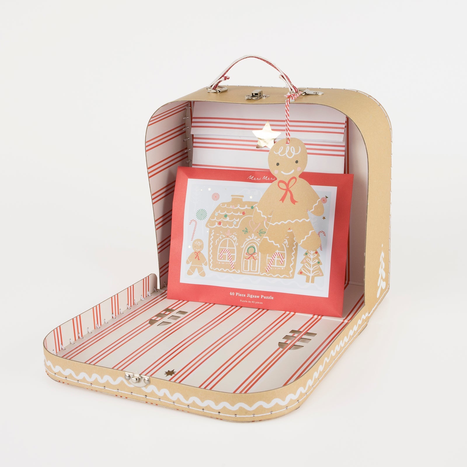 Set of gingerbread-themed cards in a decorative bag with striped interior.