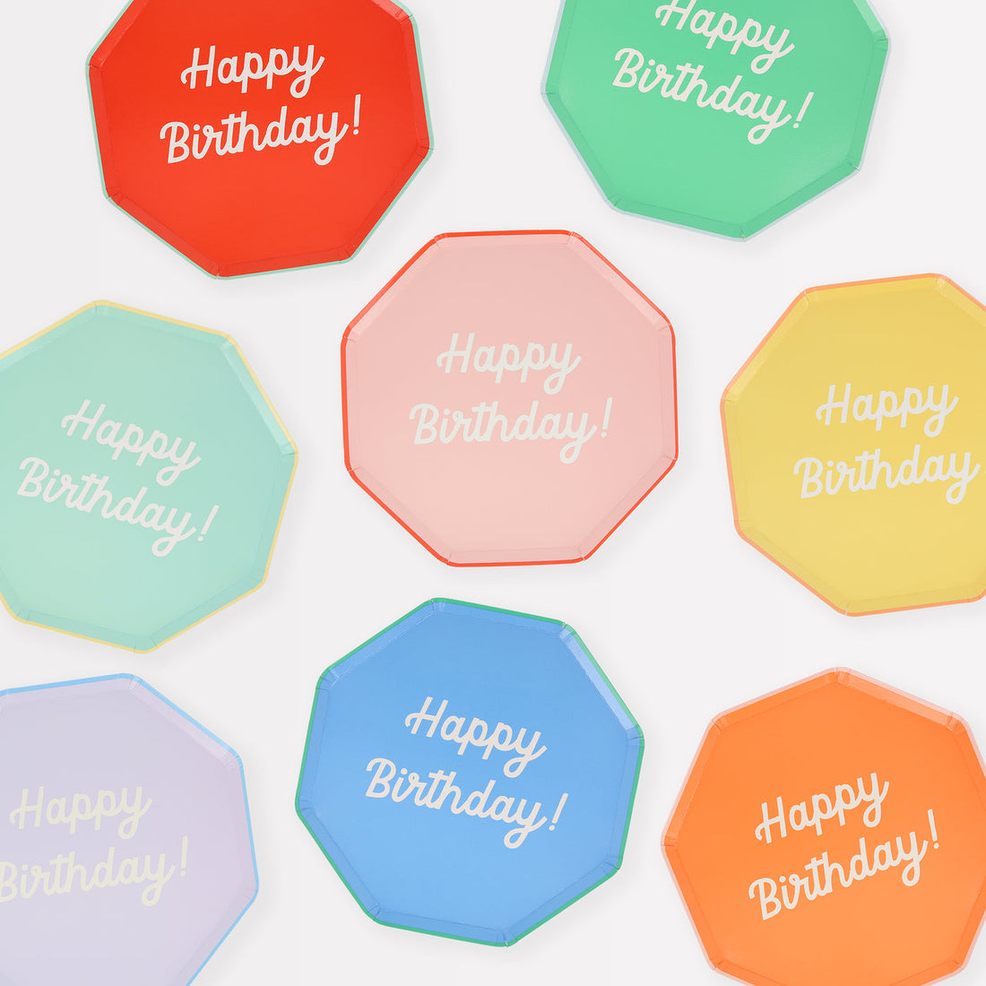 Octagonal shaped paper plates in  a red, pink, mint, orange, yellow, blue, lilac and green plate with co-ordinating colored borders saying "Happy Birthday!".