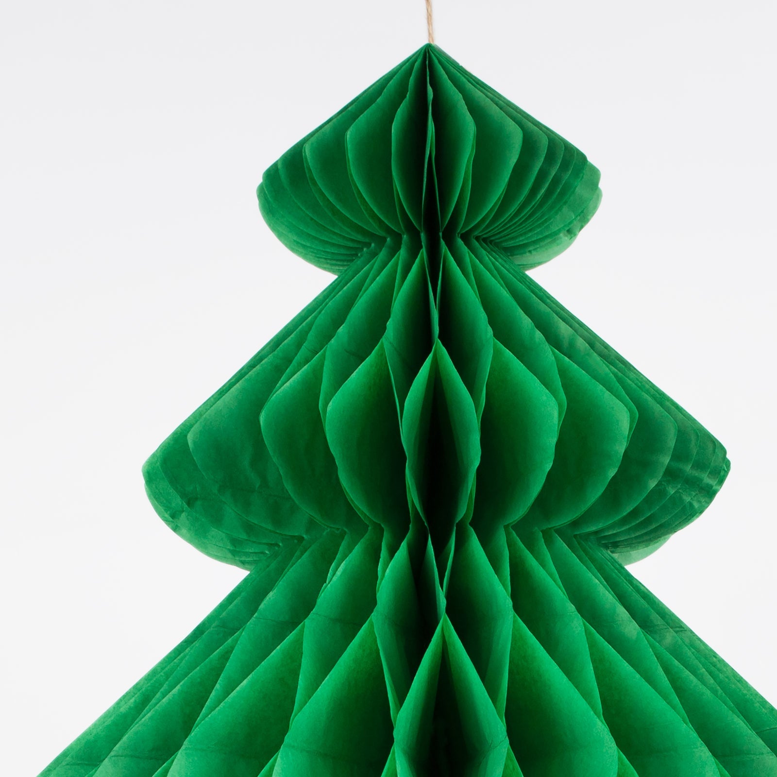Giant hanging tree decorations with tissue paper honeycomb details by Meri Meri.
