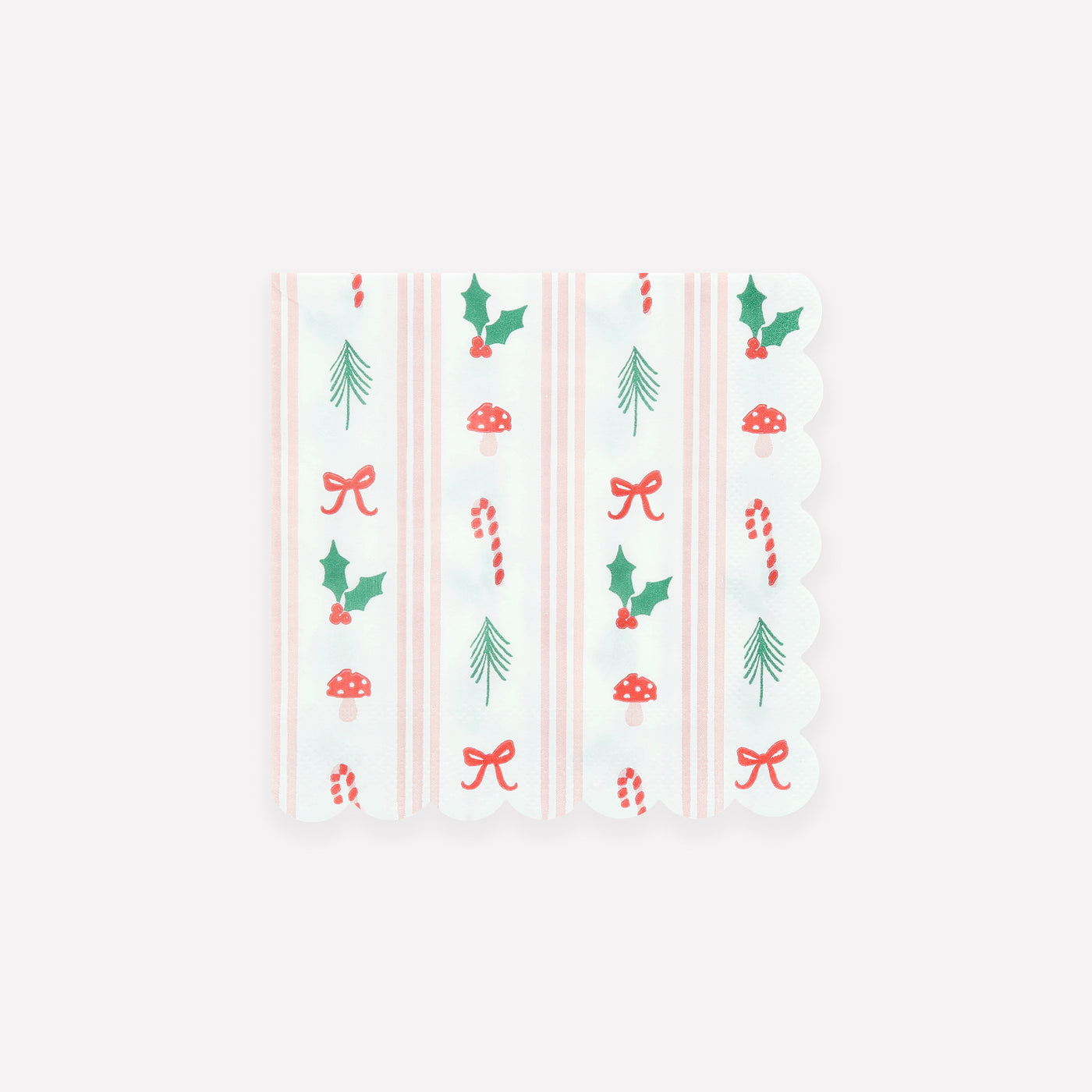 Patterned paper napkin with Christmas-themed designs on a white background.