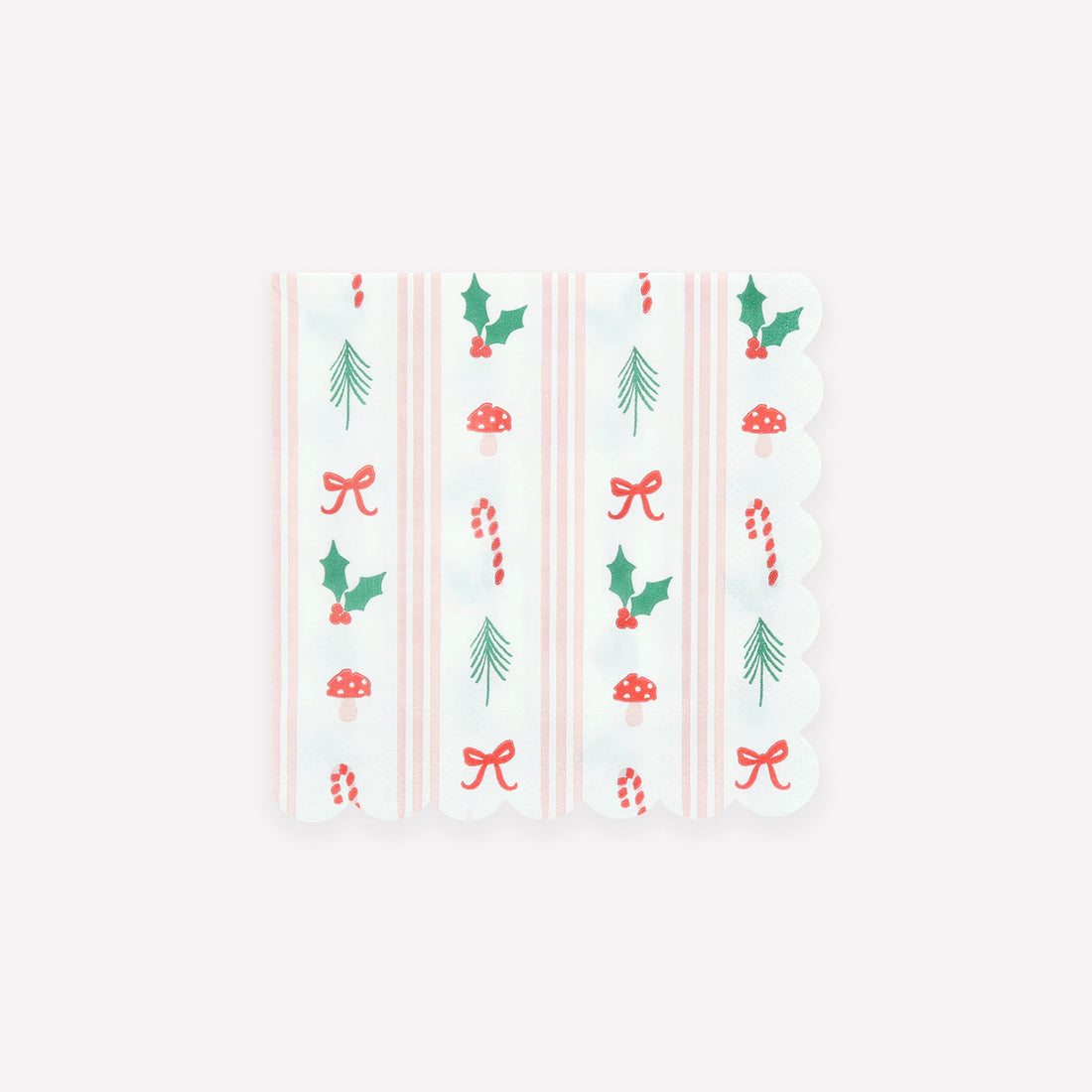 Patterned paper napkin with Christmas-themed designs on a white background. 