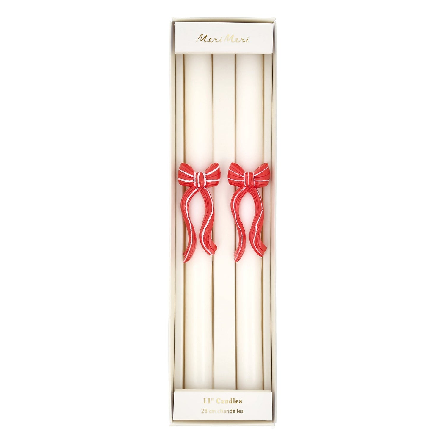 Set of two candles with red bows in a decorative box on a white background.