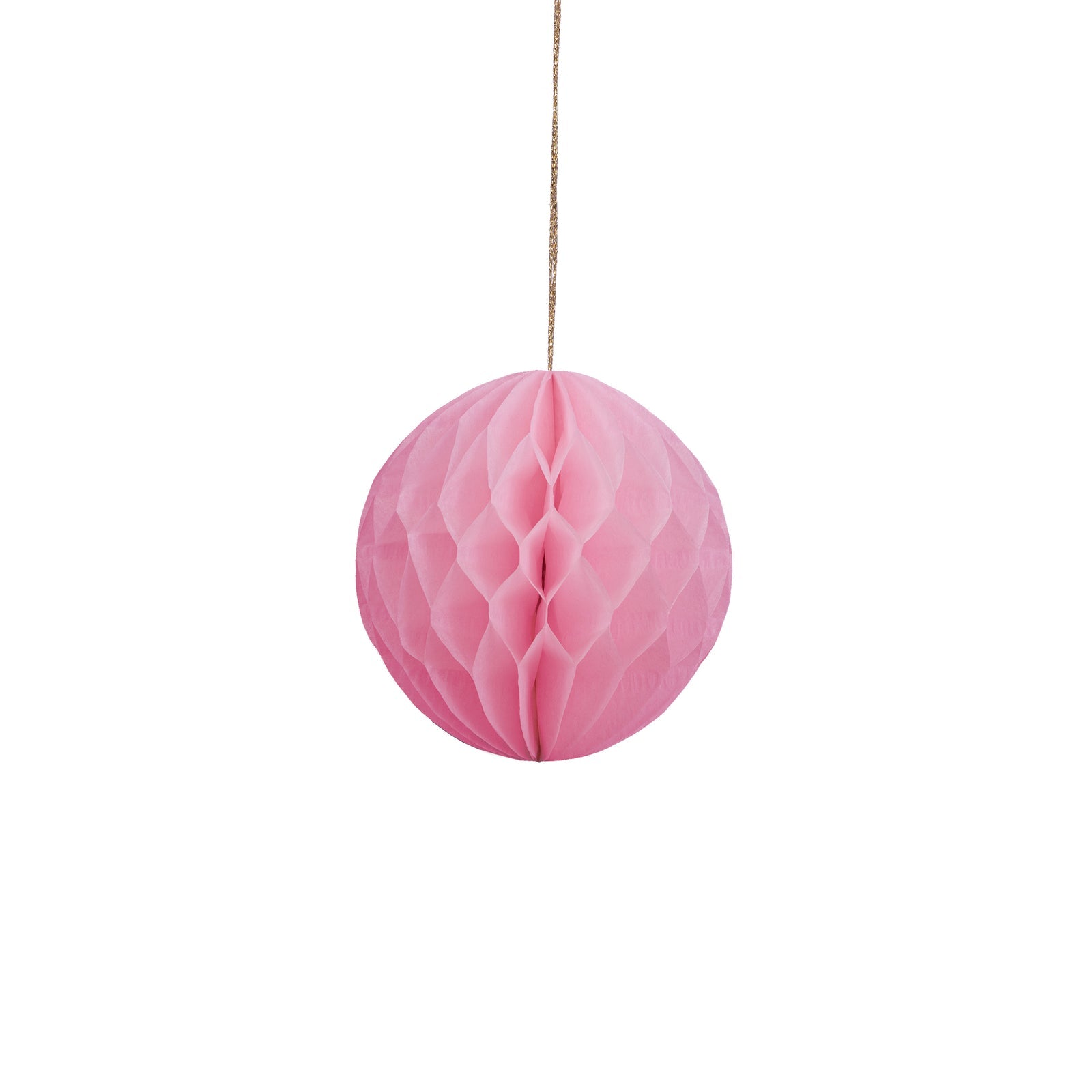 Pink honeycomb ball hanging on a white background.