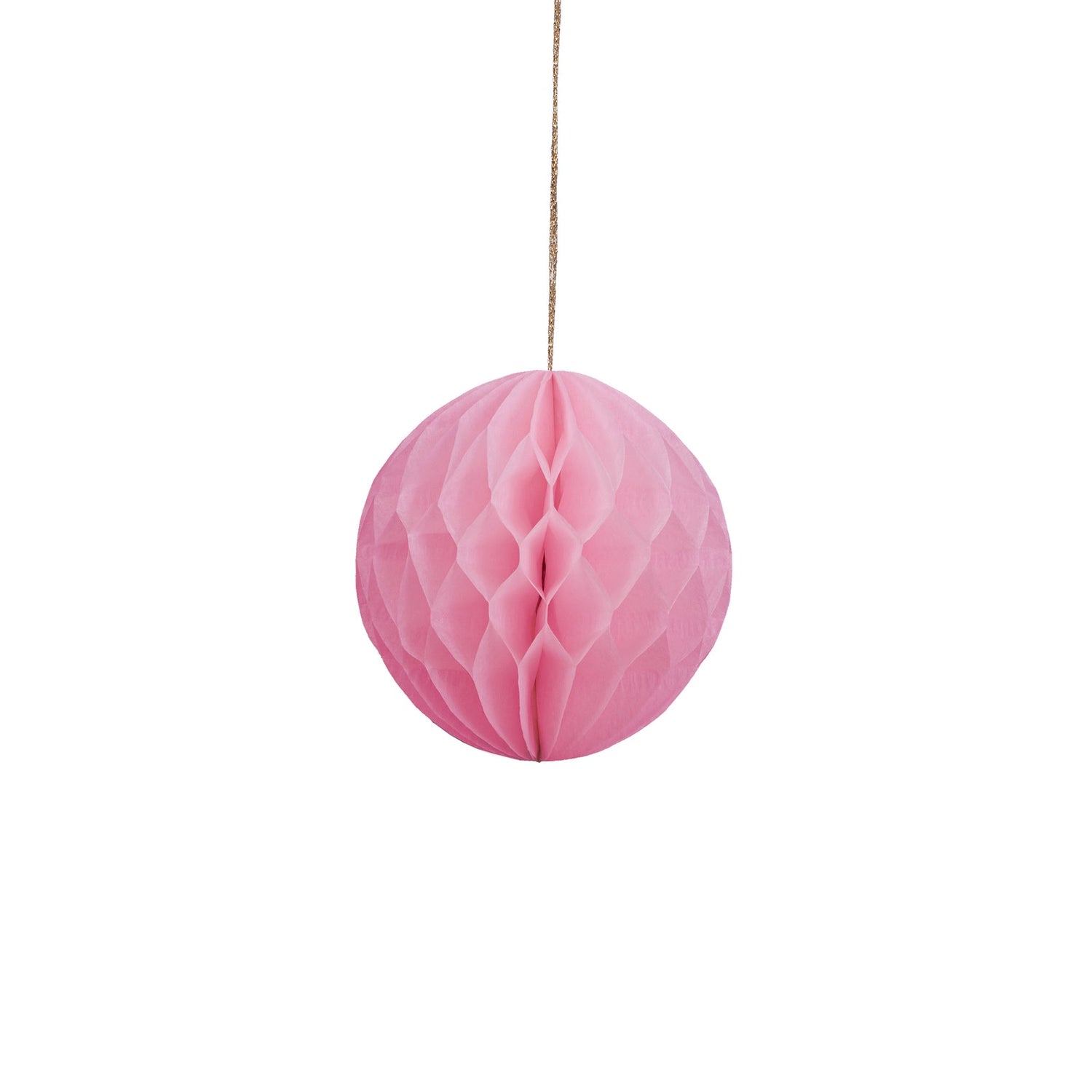 Pink honeycomb ball hanging on a white background.