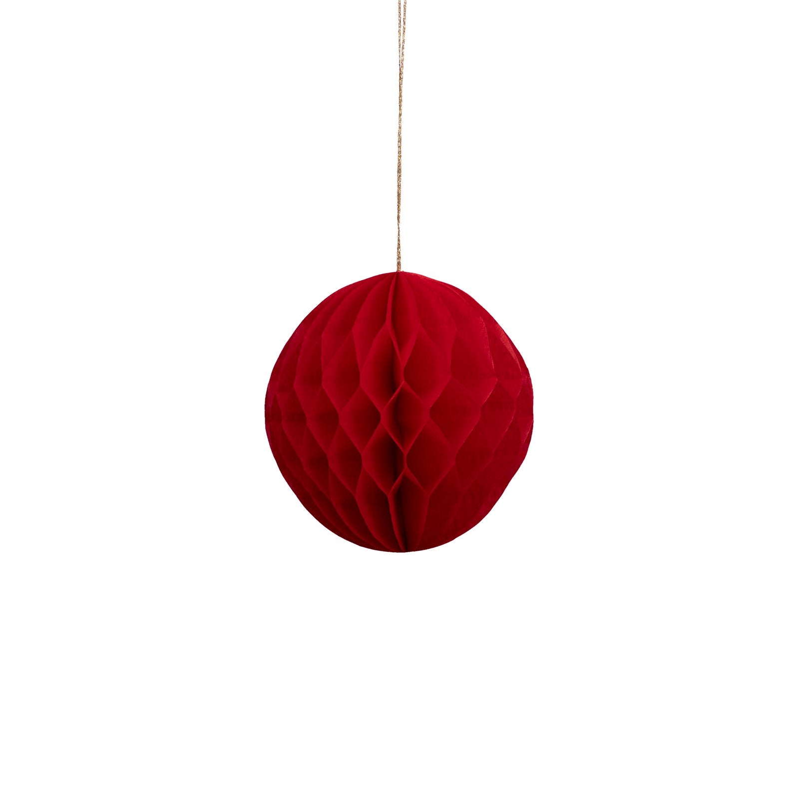 Red honeycomb ball hanging on a white background.