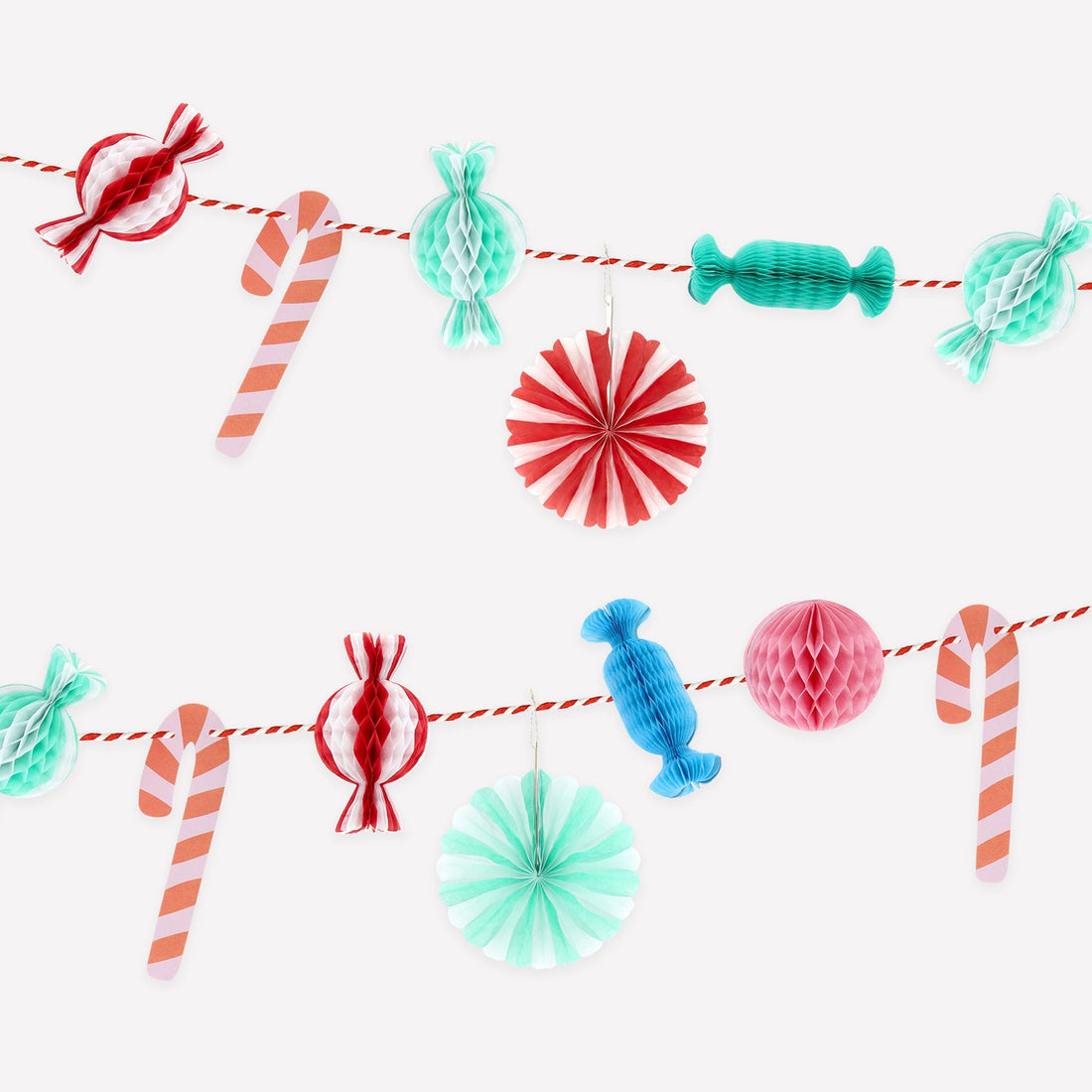 Colorful paper candy garland on a white background.