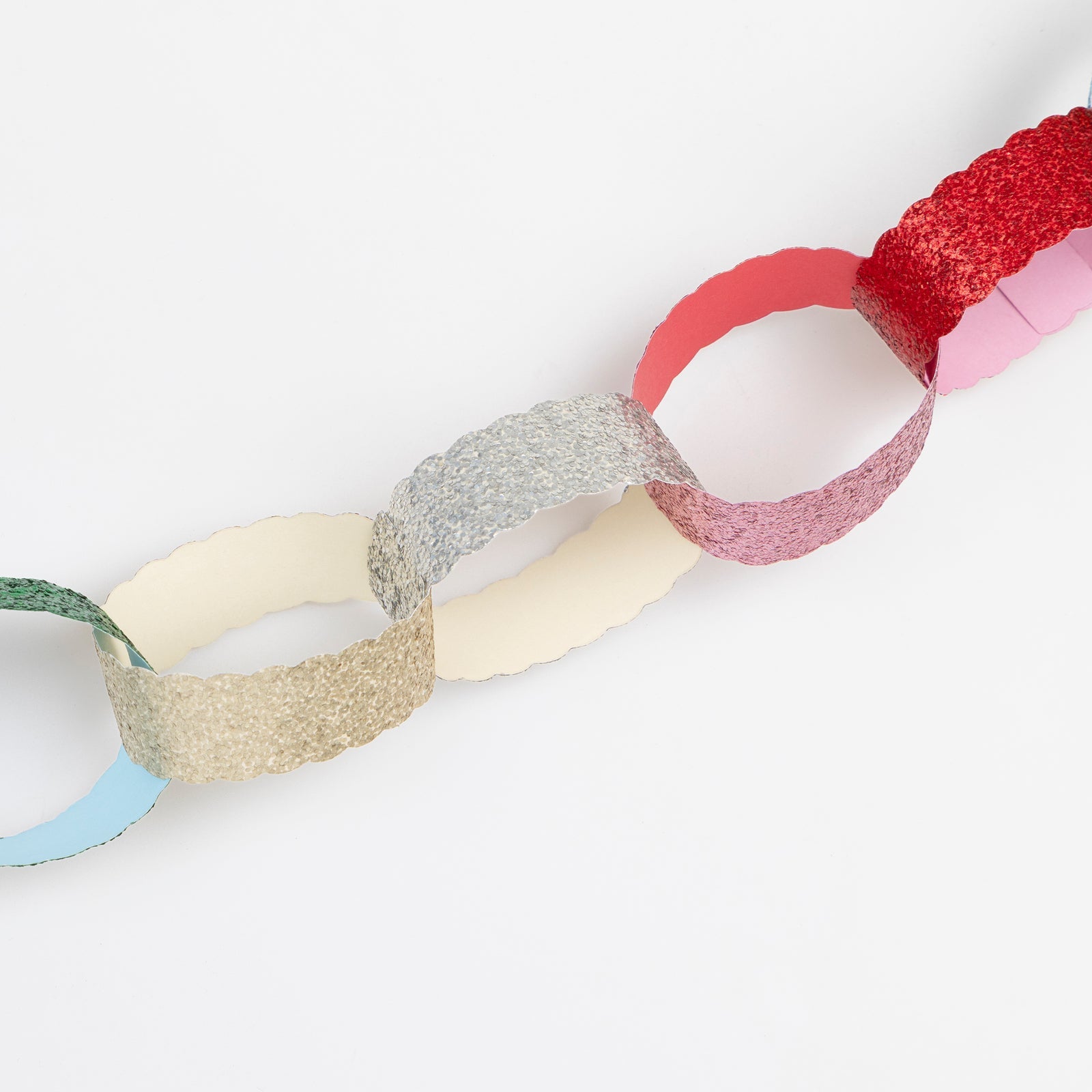 Colorful paper chains on a white background.