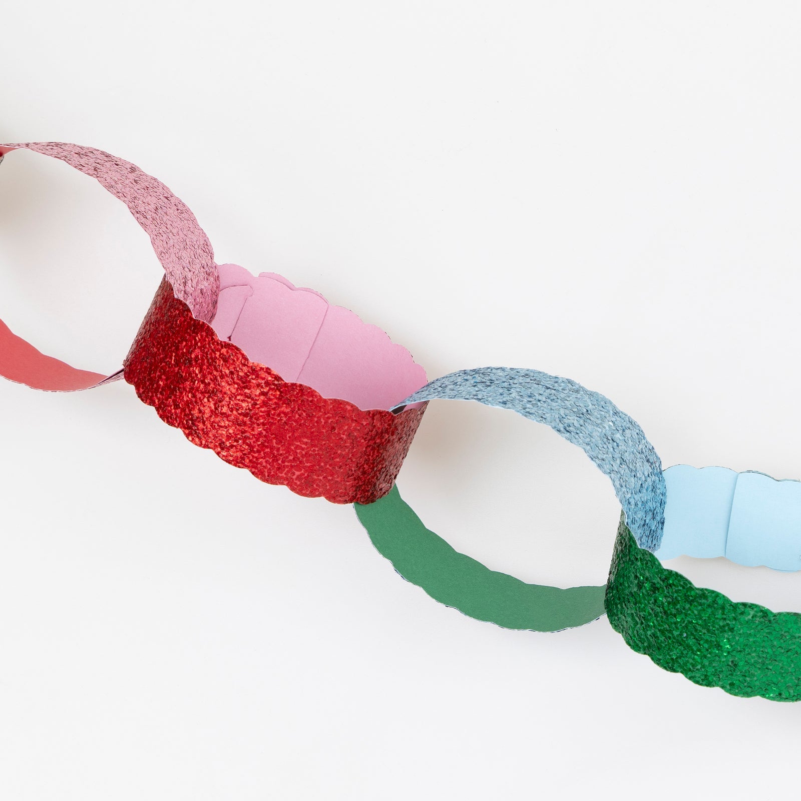 Colorful paper chains on a white background.
