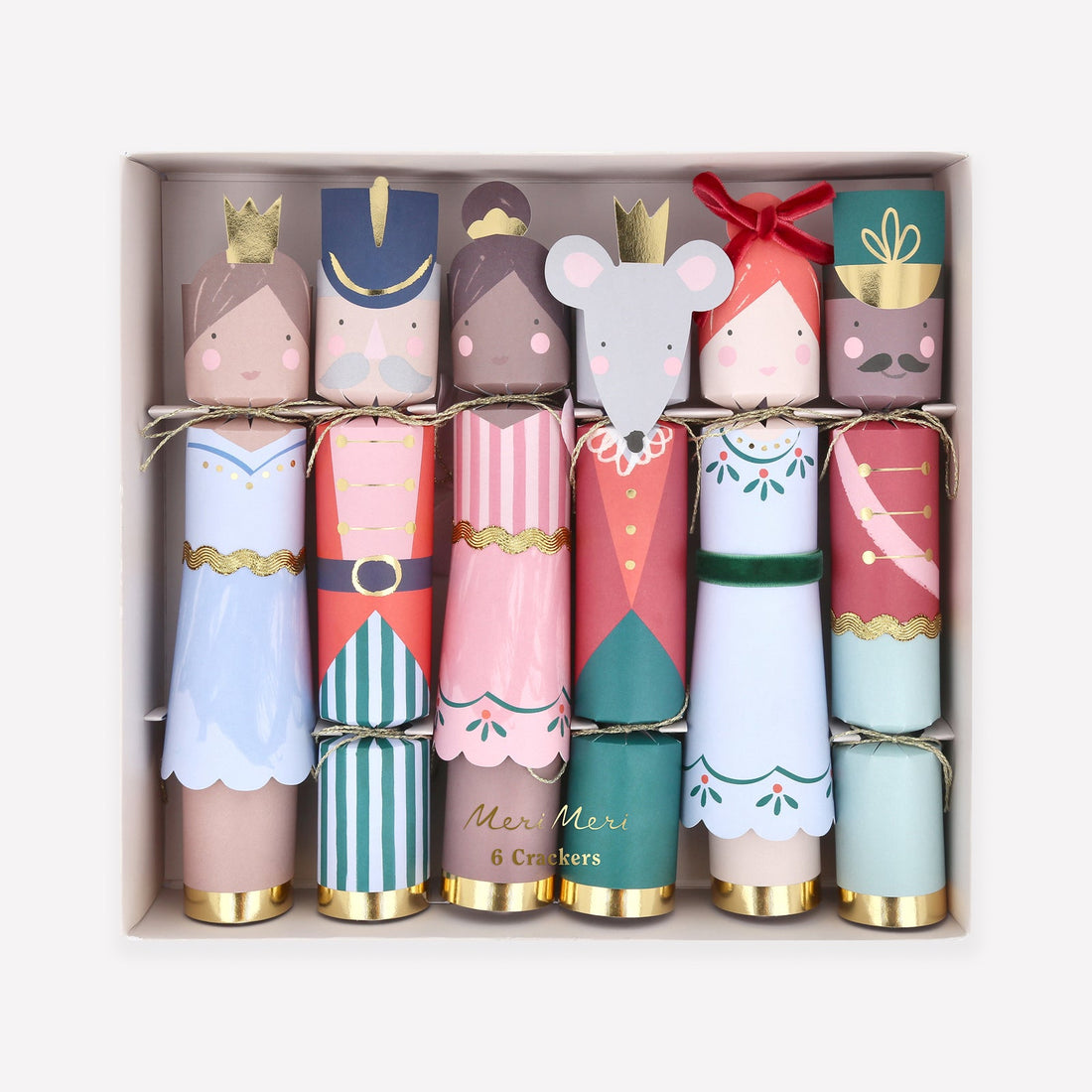 Set of colorful Christmas crackers with characters from The Nutcracker in a box.