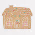 Decorative gingerbread house-shaped paper plate with colorful details on a white background.
