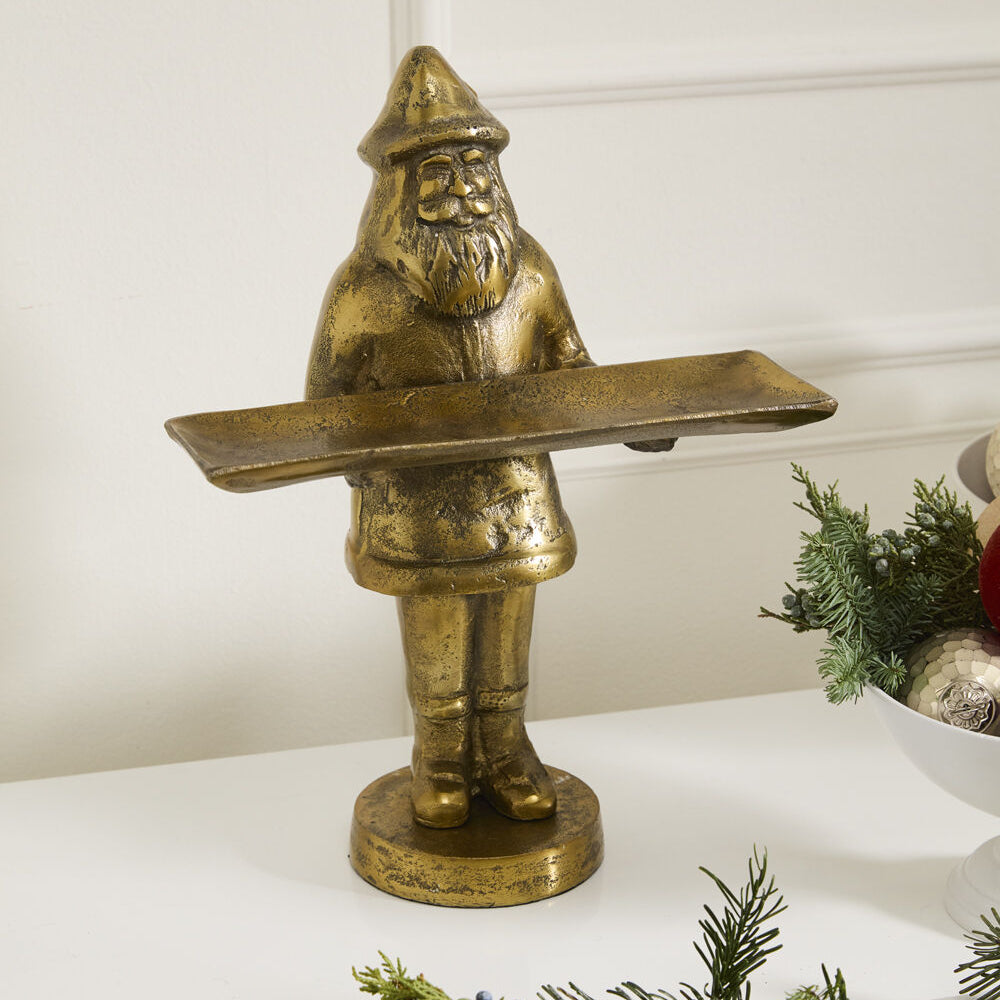 Saint Nick Dish Stand on a Christmas decorated mantle.