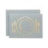 A light gray card with the silhouette of a place setting including a plate and cutlery in solid gold leaf.