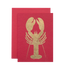 A red card featuring the silhouette of a lobster in solid gold leaf.
