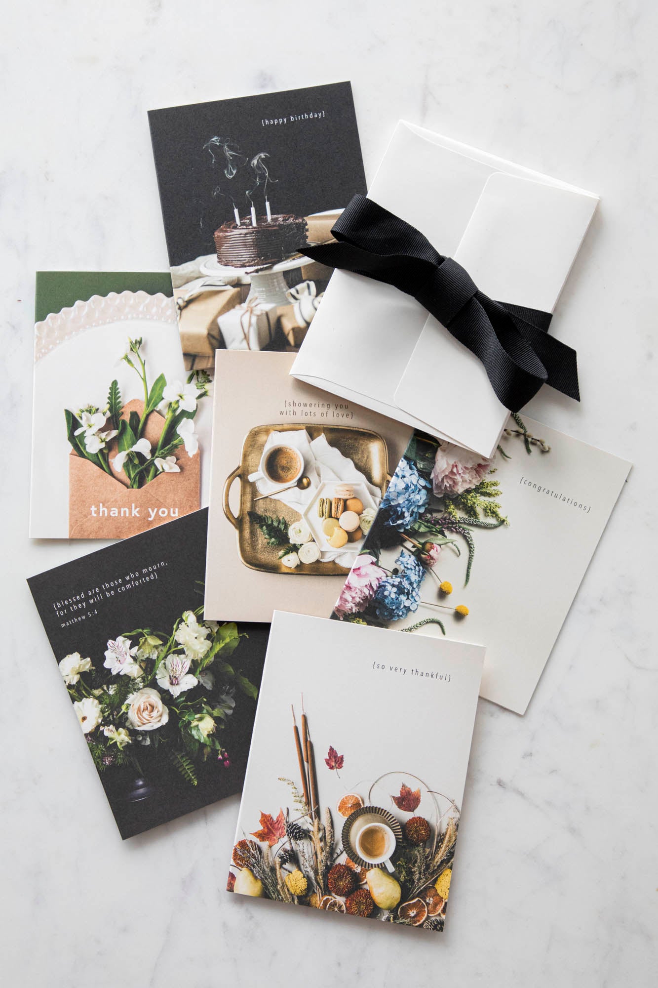 A collection of six various Pen + Piper greeting cards, each of which displays a lovely photograph and inspiring message.