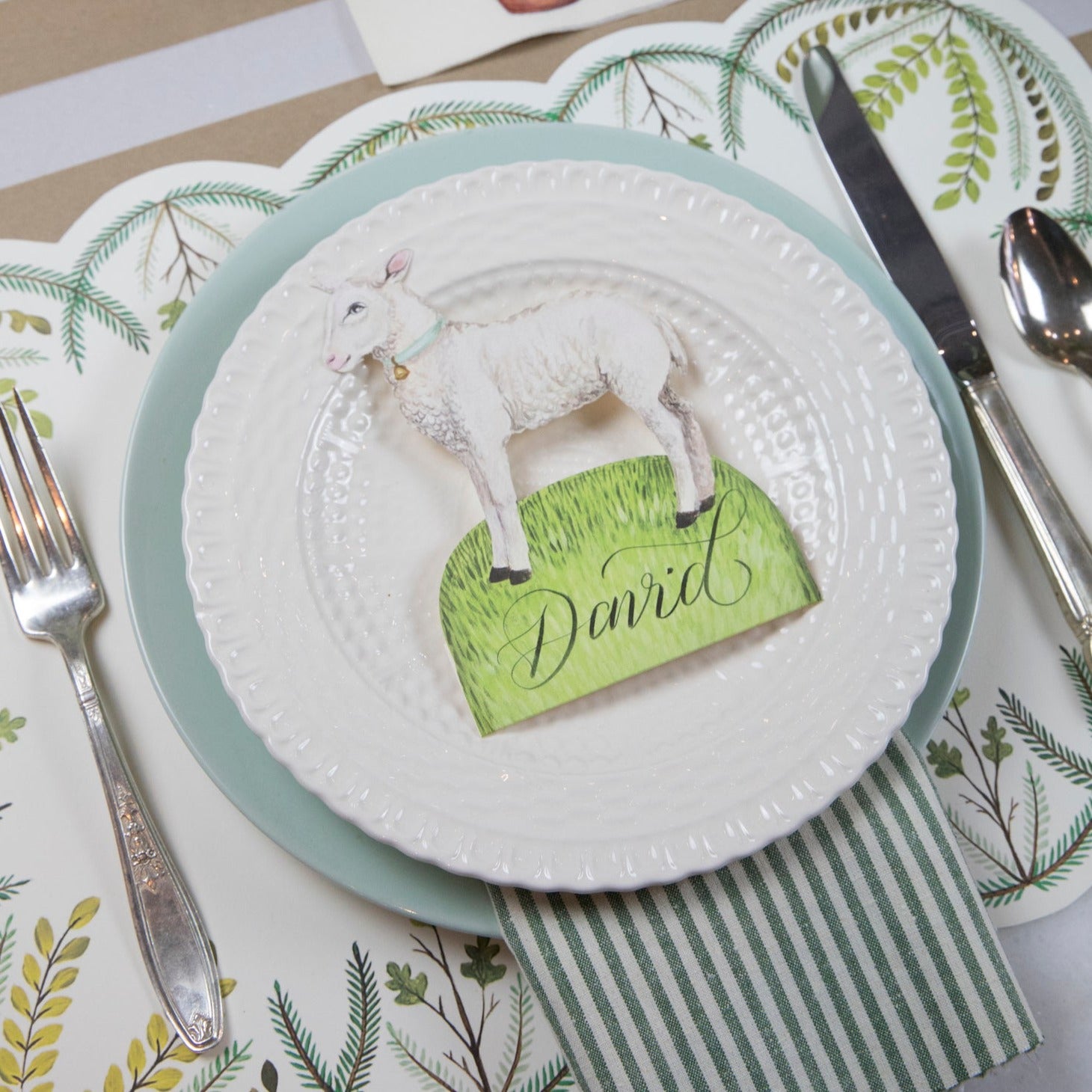 A table setting with a Little Lamb place card by Hester & Cook.