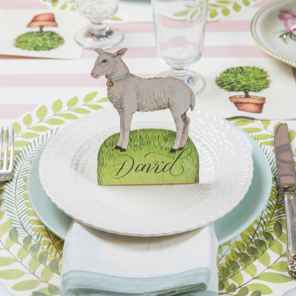 A Little Lamb Place Card by Hester & Cook sets the sheep-themed Easter table setting.