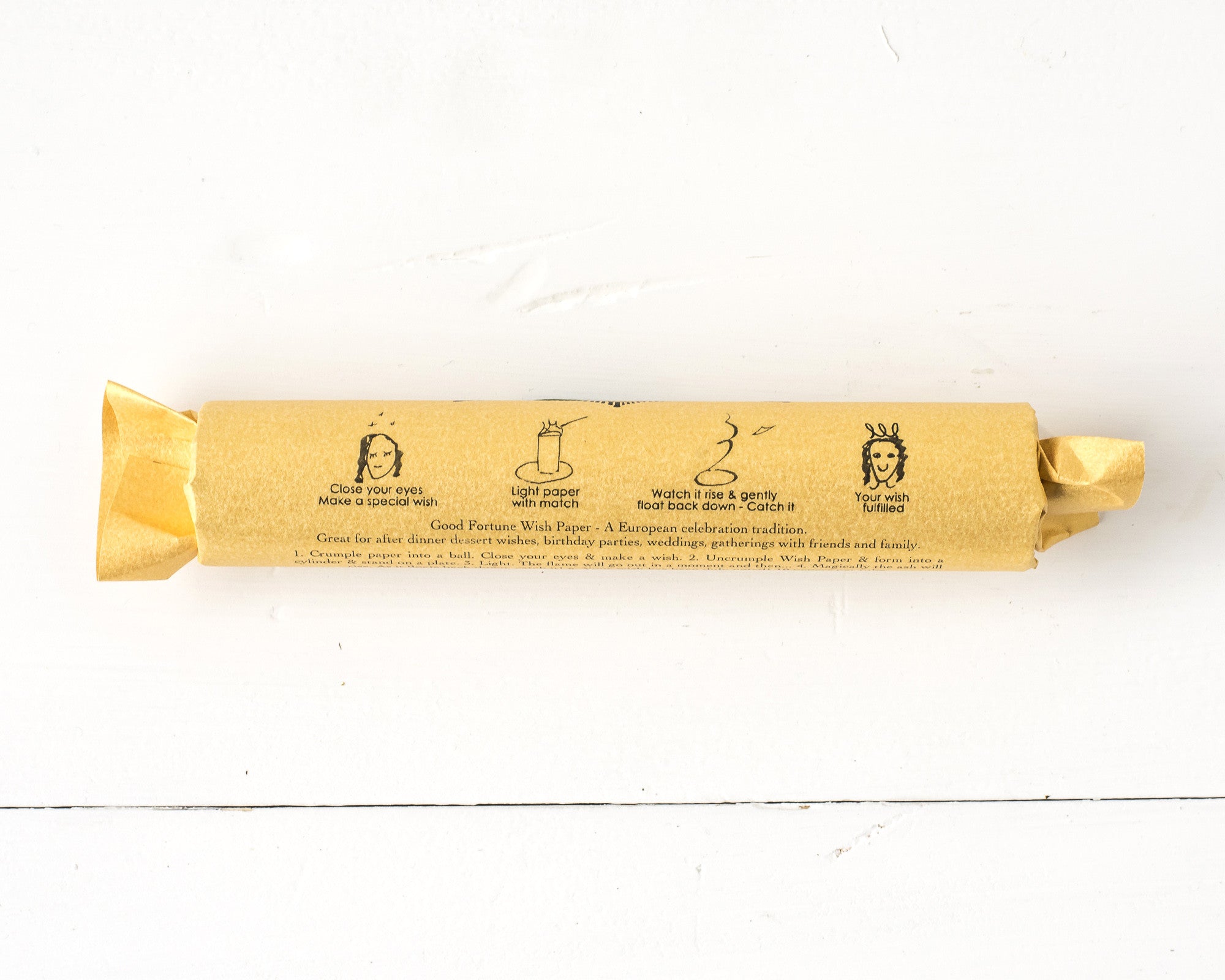 A roll of  Tops Malibu Wish Papers on a white background.