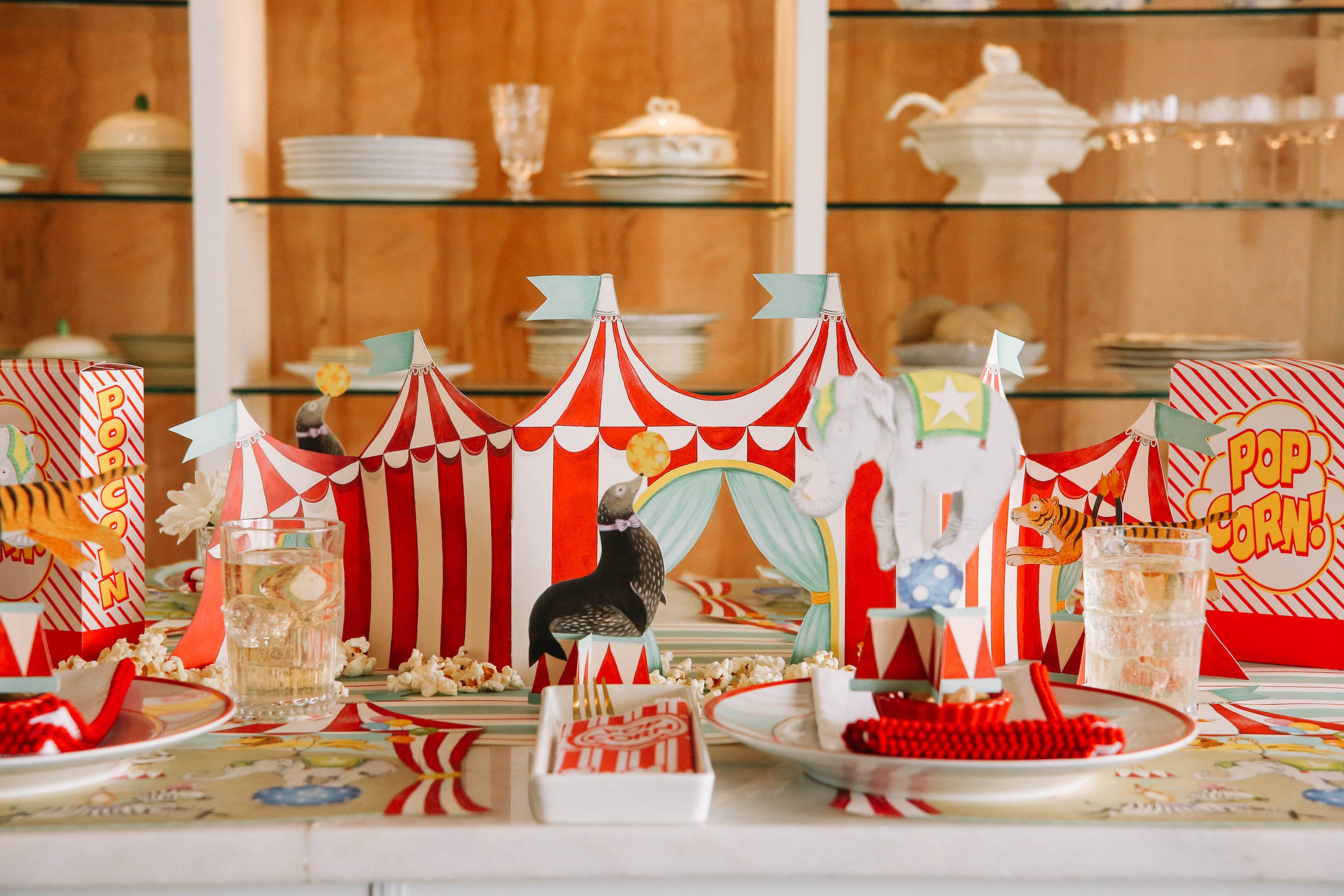 A red and white striped Hester & Cook Circus Tent Centerscape.