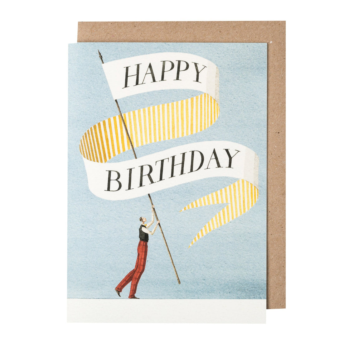 A greeting card featuring a stylized illustration of man holding a gigantic banner on a pole, which reads &quot;HAPPY BIRTHDAY&quot; on the front and is decorated with gold and white stripes on the back, over a light blue background. The included kraft paper envelope is tucked behind the card.
