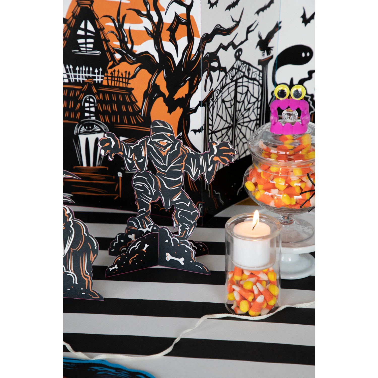 Three Monster Mash Table Ornaments, depicting spooky creatures, on a white background by Hester &amp; Cook.