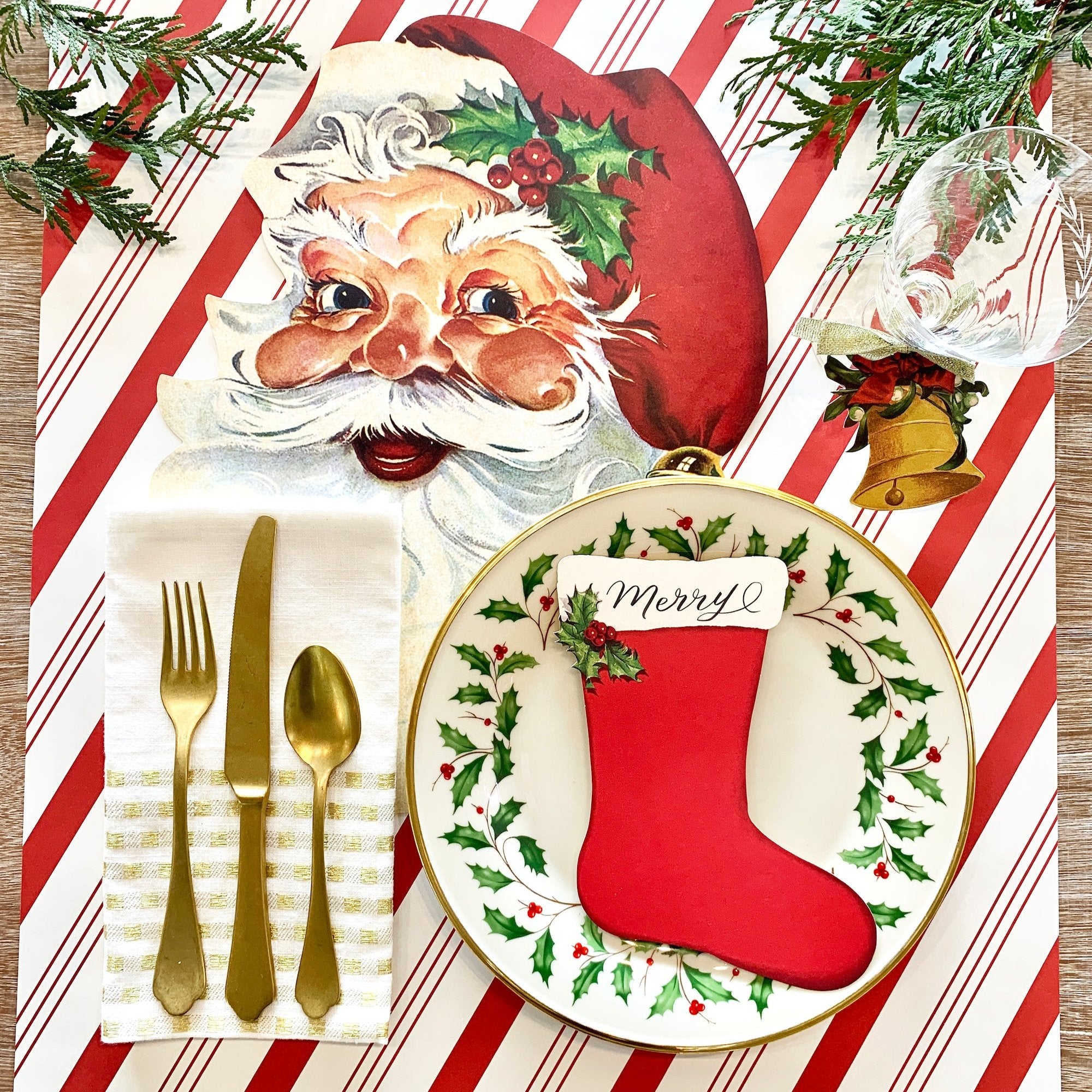 A die-cut, vintage-style illustration of Santa Clause&