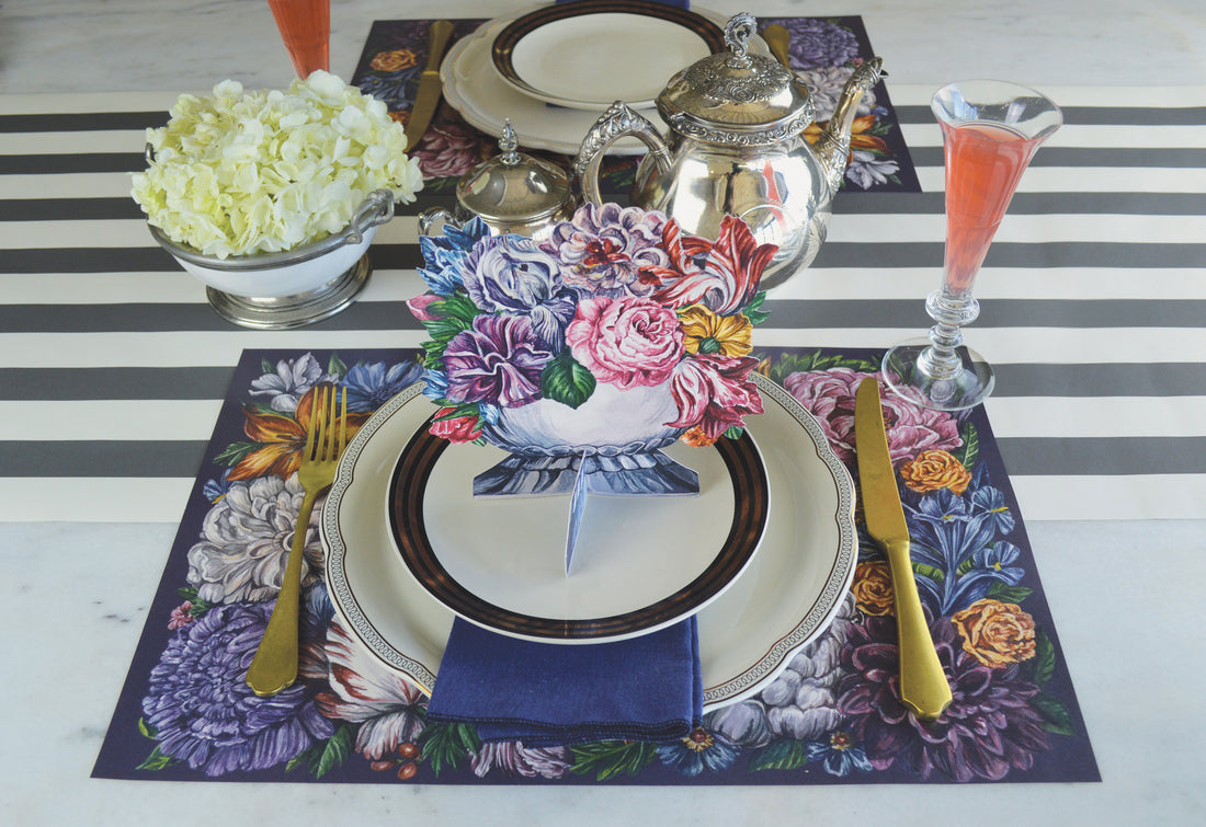 An elegant floral place setting featuring a Floral Cascade Table Ornament on the plate, adding three-dimensional flair to the table.