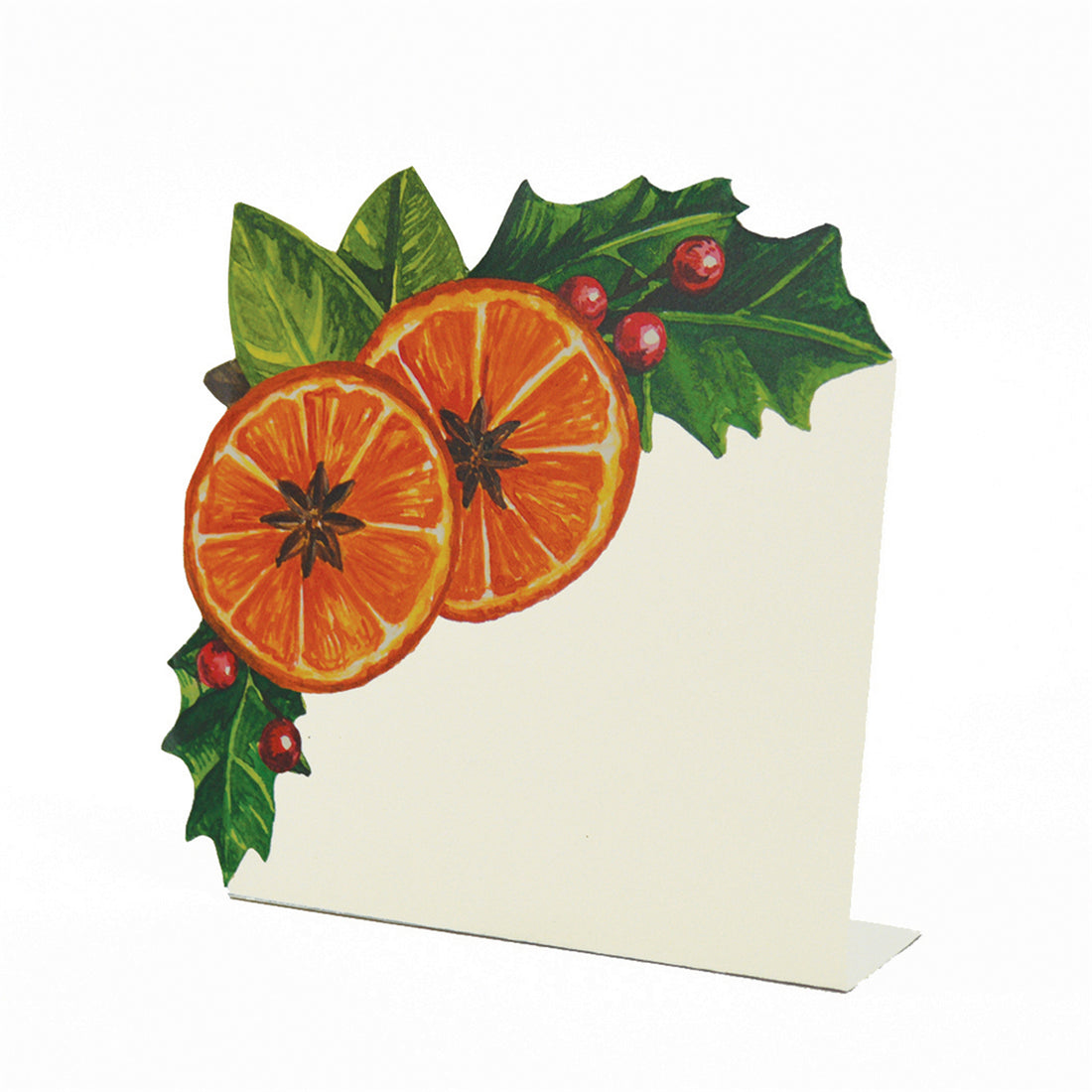 A white, square, freestanding place card featuring two vibrant orange slices with star anis and winter foliage adorning the upper left corner.