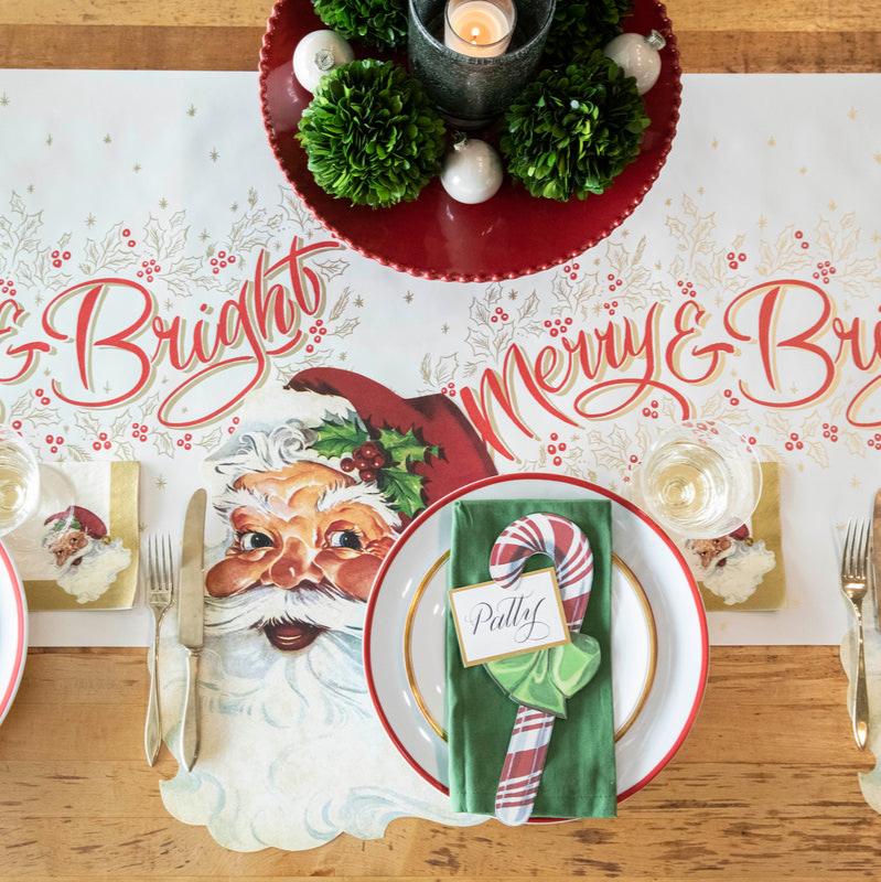 The Die-cut Santa Placemat under a festive Christmas table setting, from above.