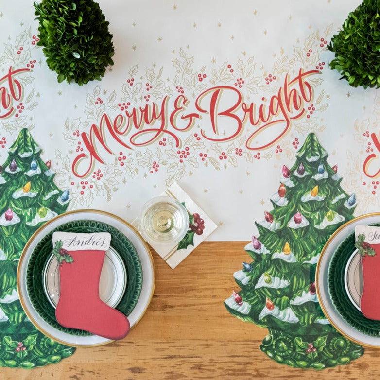 The Die-cut Vintage Christmas Tree Placemat under a festive Christmas table setting, from above.