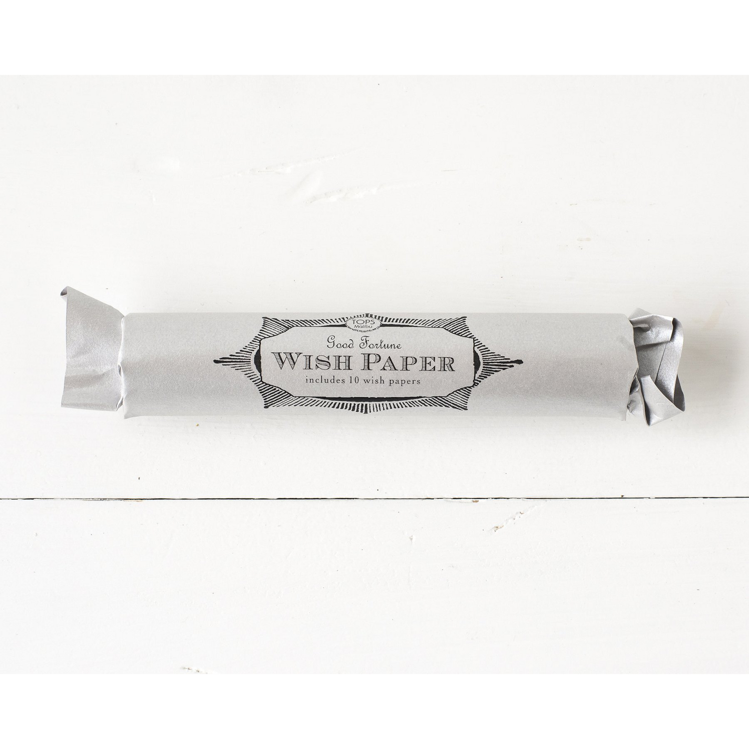 A roll of  Tops Malibu Wish Papers on a white background.