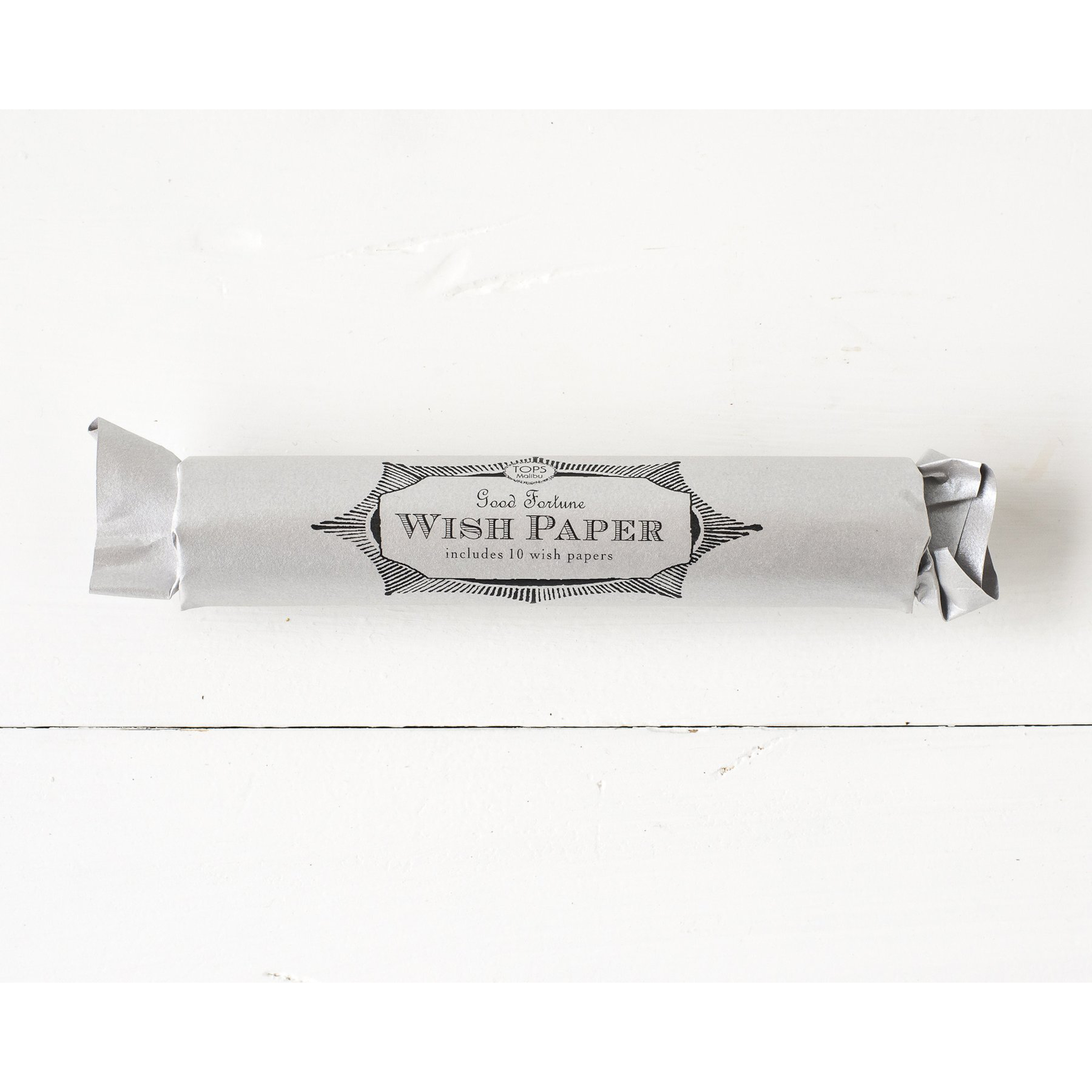 A roll of  Tops Malibu Wish Papers on a white background.