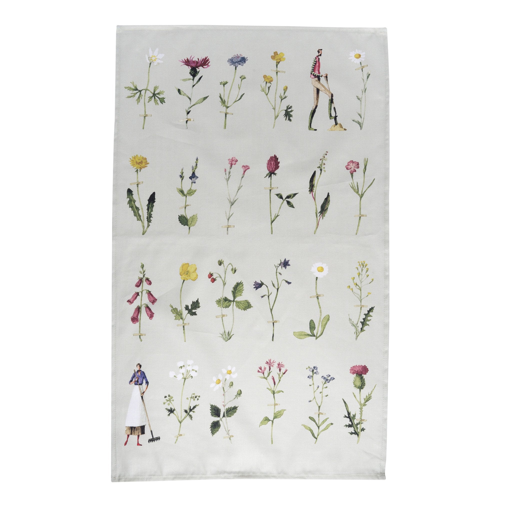 A pale green tea towel featuring a grid of illustrated wildflowers, with a man and woman holding gardening tools standing amongst the flowers.