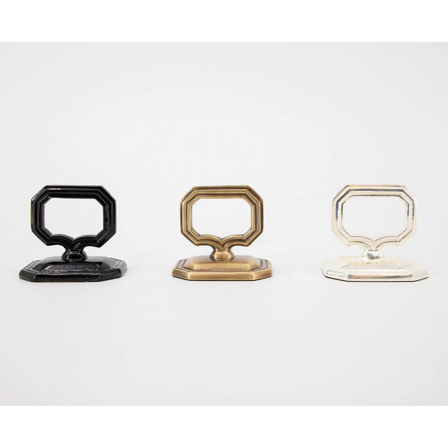 Three vintage-style Napkin Rings with Place Card Holders in Black, Brass and Silver.