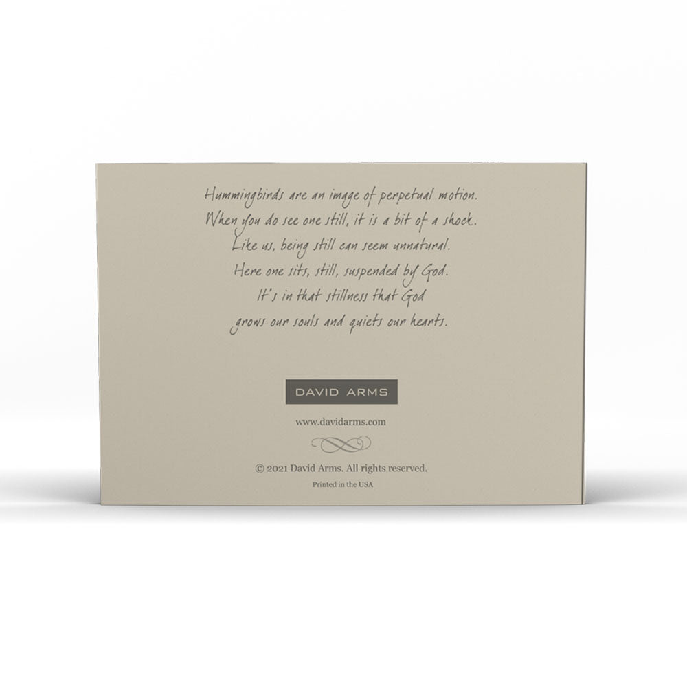 Handcrafted "Be Still & Know" (Tags) notecard of a hummingbird perched on the word "style" written in unique typography on textured paper, accompanied by art tools on a worn surface by David Arms.