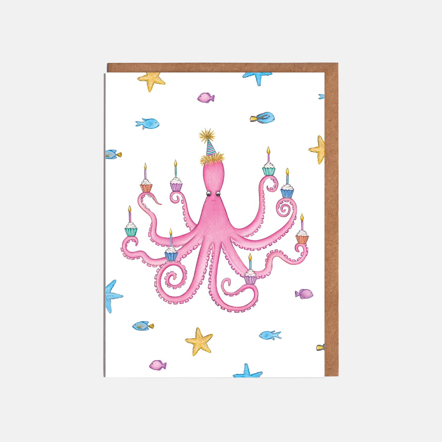 A colorful birthday card featuring a hand-drawn octopus with pink tentacles, balancing cupcakes on its tentacles, and wearing a birthday hat. Smaller fish illustrations adorn the background.