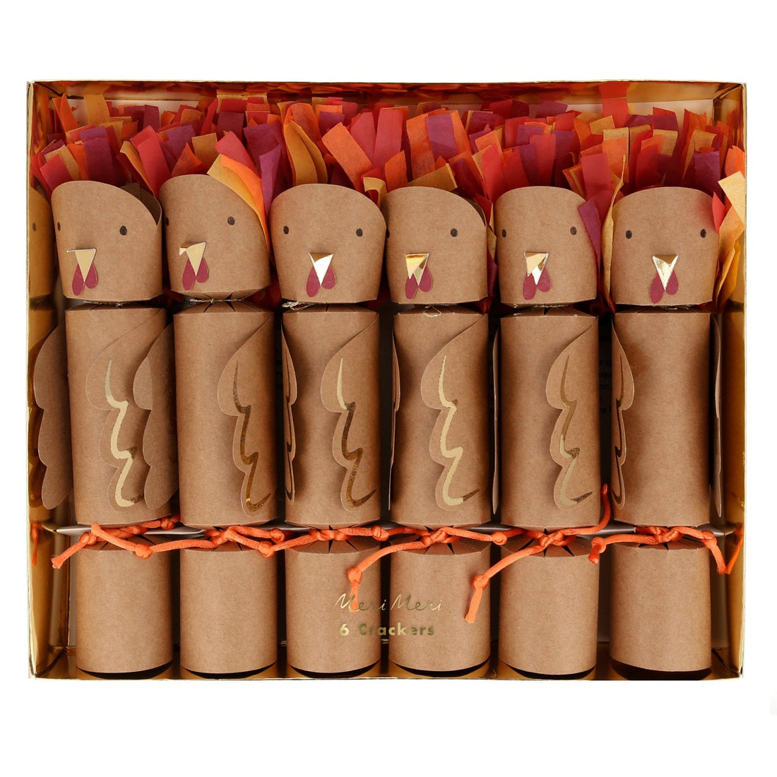 Crackers with a turkey face, tissue paper tail, gold foil beak and gold foil details