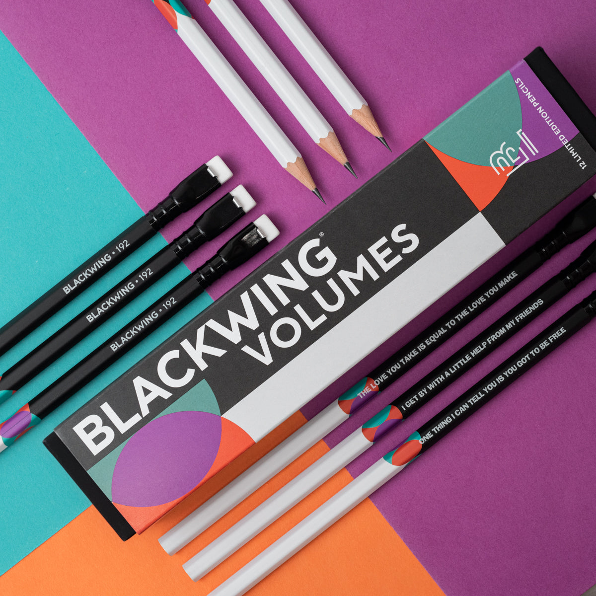 A group of Blackwing Volume 192- Tribute to John Lennon and Paul McCartney (Set of 12) colored pencils with a quote on them about songwriting by John Lennon and Paul McCartney.