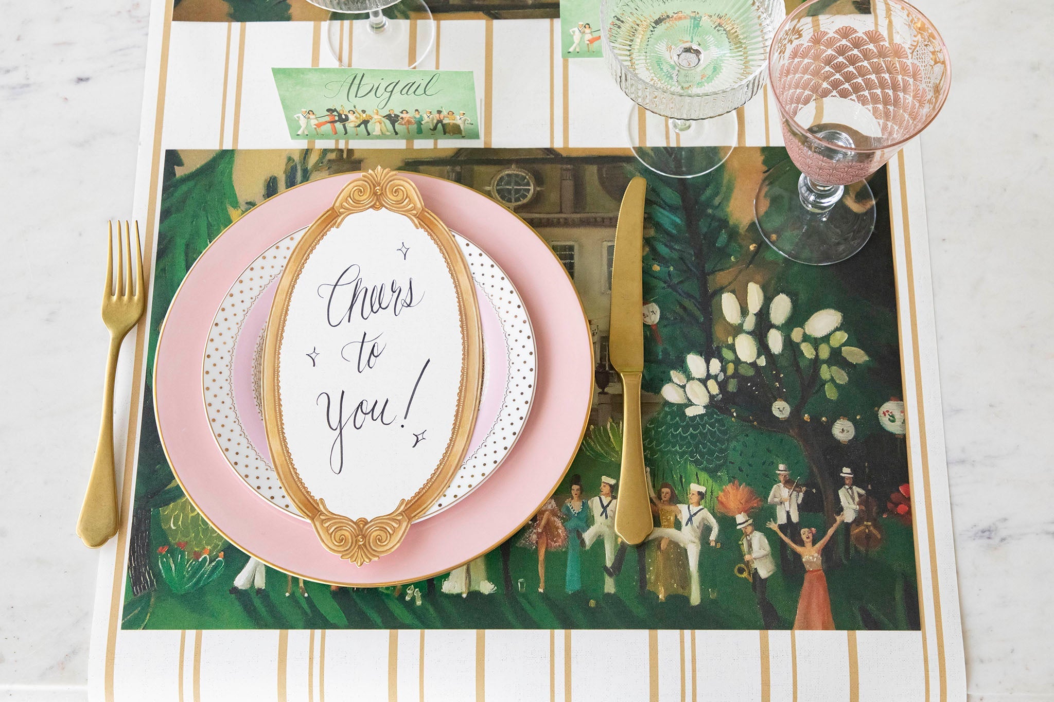 An elegant place setting featuring the High Kick Placemat and place card.