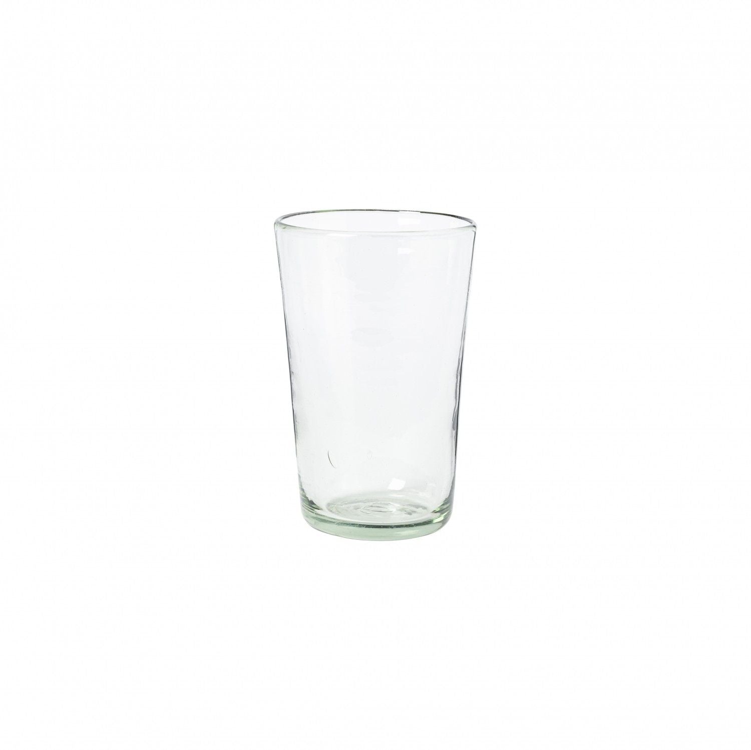 Three empty Margarida Recycled Glasses vessels of varying heights and shapes, made by Casafina Living, rest on a white surface.